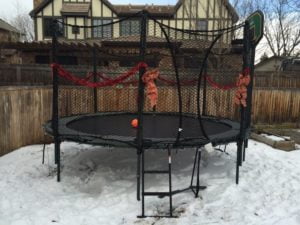 Trampoline in the Colroado winter with safety net