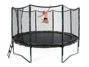 girl bouncing on her variable bounce trampoline