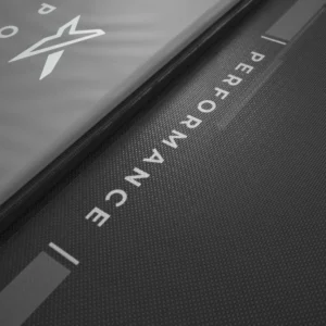Close up of the performance mat and it says performance next to the springs in white, on black.