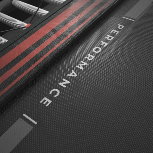 Close up image of Acon Performance mat's safety pad with the word performance printed on it and some red lines along the edge.