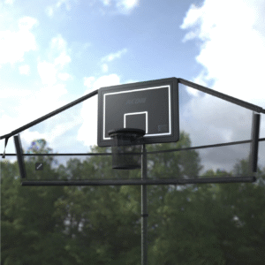 A black basketball with hoop and backboard with nets on the sides stands in front of trees under a partly cloudy sky.